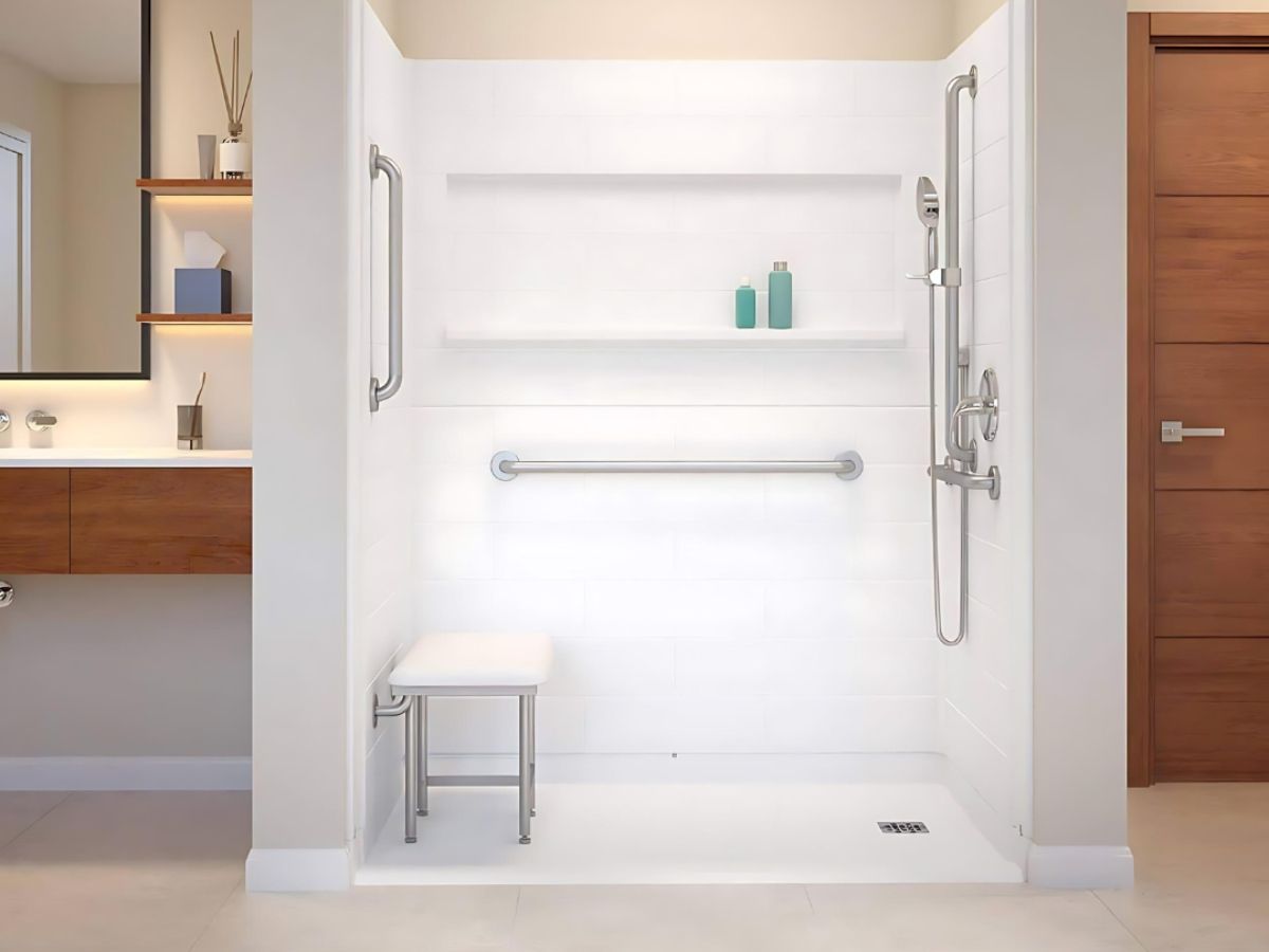 Walk-in shower with a low threshold and no tub wall to step over