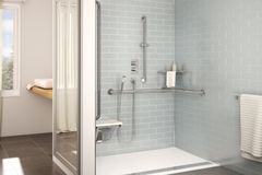 Barrier-free walk-in shower with a built-in bench and grab bar