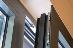Close-up of a window frame corner showing the sash and frame profile