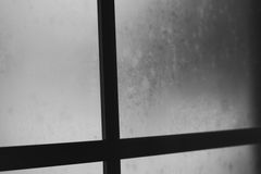 Condensation trapped between the panes of a double-glazed window
