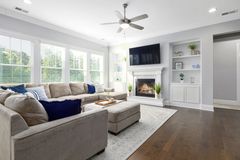 Newly installed double-hung windows in a bright living room